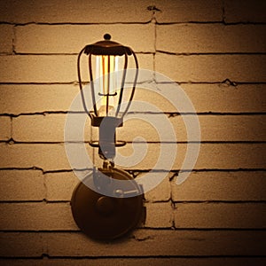 Vintage light fixture on wall, glow, brick or concrete wall texture