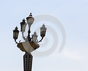 A Vintage Four-Way Outdoor Light Post