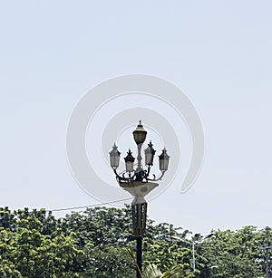 Vintage Four-Way Light Post On The Street