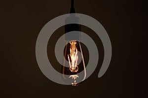 Vintage lightbulb on dark background