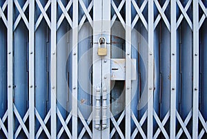 Vintage locked old metal door