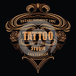 Vintage logo for the tattoo studio on the dark background.