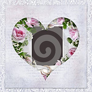 Vintage love background with frame in the shape of heart, roses, wedding rings