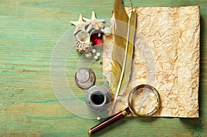 Vintage map, compass, magnifier