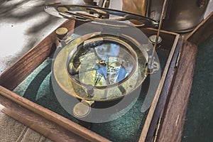 Vintage marine navigational compass outdoors