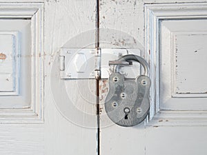 Vintage master key is lock on wood door
