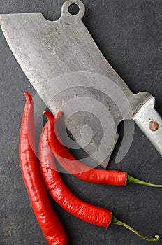 Vintage meat cleaver with chili pepper