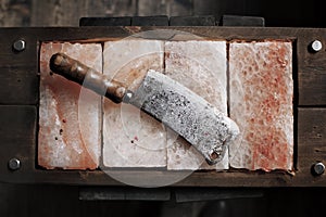 Vintage Meat cleaver on Himalayan pink salt.