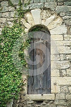 Vintage medieval door of a guard tower