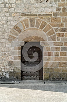 Vintage medieval door of a guard tower