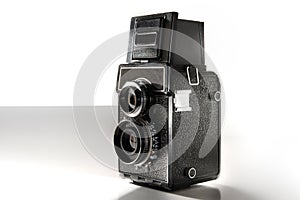 Vintage medium format camera isolated on white photo