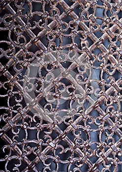 Vintage metal grille with ornate patterns