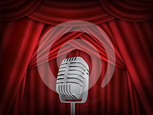 Vintage metal microphone. Red silk curtain backdrop. Retro mic on empty theatre stage.