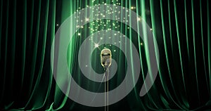 Vintage metal microphone, retro item against green velvet curtain background with glitter bokeh