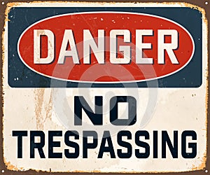 Vintage Rusty Danger No Trespassing Metal Sign. photo