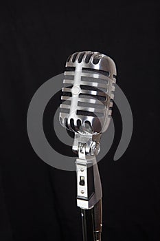 Vintage microphone, black background