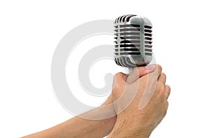 Vintage microphone with hands isolated