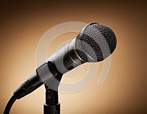 Vintage Microphone Illuminated by a Warm Spotlight on Stage