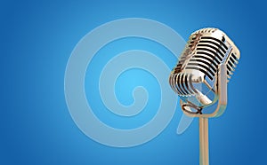 Vintage Microphone isolated on blue banner with copy space photo