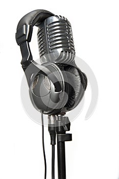 Vintage Microphone with modern headphones