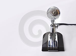 Vintage microphone on white background