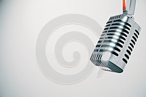 Vintage microphone at white background
