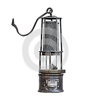 Vintage miner's lamp isolated on a white background