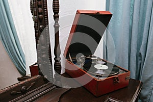 Vintage mirror and old gramophone