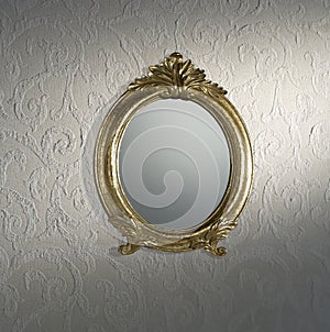 Vintage mirror on wall photo