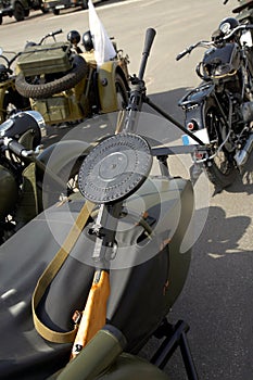 Vintage motorcycle with sidecar and machinegun