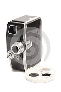 Vintage movie camera with filters isolated on white background