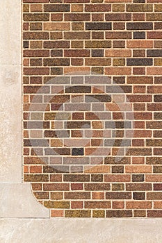 Vintage multi-shade brown brick wall texture background