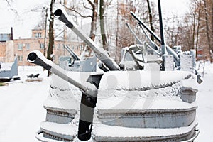 Vintage naval artillery of the Second World War with snow