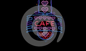 Vintage Neon Cafe Sign on Small Town Restaurant at Night