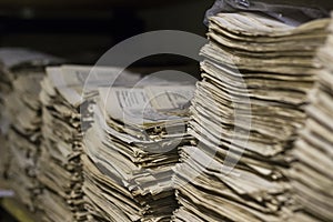 Vintage newspaper archive stack