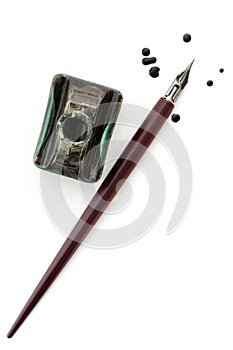 Vintage Nib Pen and Inkwell over White photo