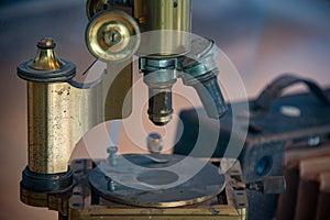 Old ancient microscope detail close up