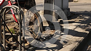Vintage Old Bike Vintage Old Bike Wheel in Parking Rack in Parking Rack with Shadow