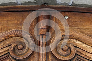 Vintage old brown wood door with patterns. Background. Tamplete