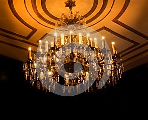 Chandelier Illuminates dark room photo