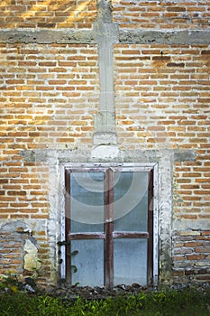 Vintage old door with brick wall. Front view of the entrace photo
