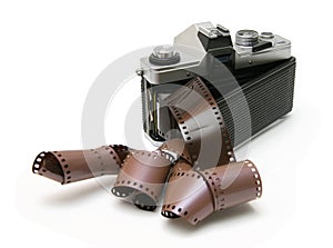 Vintage old film camera with film strip