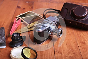 Vintage old film photo-camera in leather case