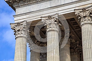 Vintage Old Justice Courthouse Column. Neoclassical colonnade with corinthian columns as part of a public building photo