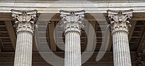 Vintage Old Justice Courthouse Column. Neoclassical colonnade with corinthian columns as part of a public building