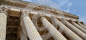 Vintage Old Justice Courthouse Column. Neoclassical colonnade with corinthian columns as part of a public building