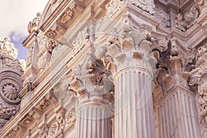 Vintage Old Justice Courthouse Column. Neoclassical colonnade with corinthian columns as part of a public building