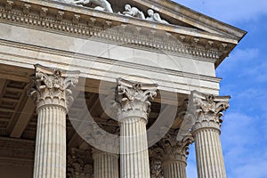 Vintage Old Justice Courthouse Column. Neoclassical colonnade with corinthian columns as part of a public building