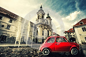 Vintage old red car scene. Graz, Austria.