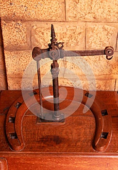 A vintage old rusted metal balance in the bangalore palace.